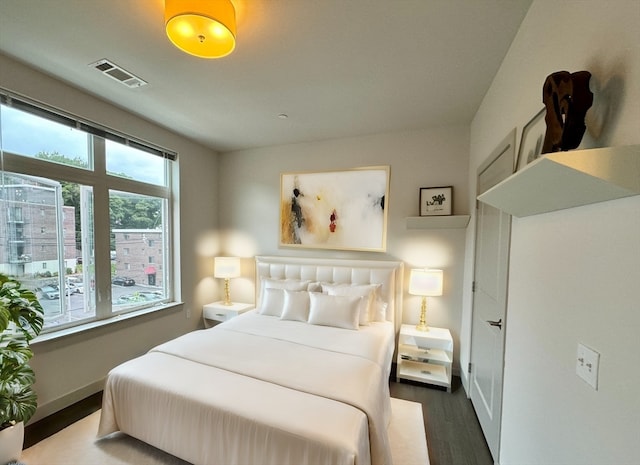 bedroom featuring hardwood / wood-style flooring