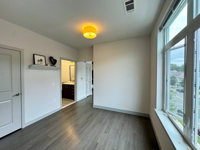 empty room featuring dark hardwood / wood-style floors