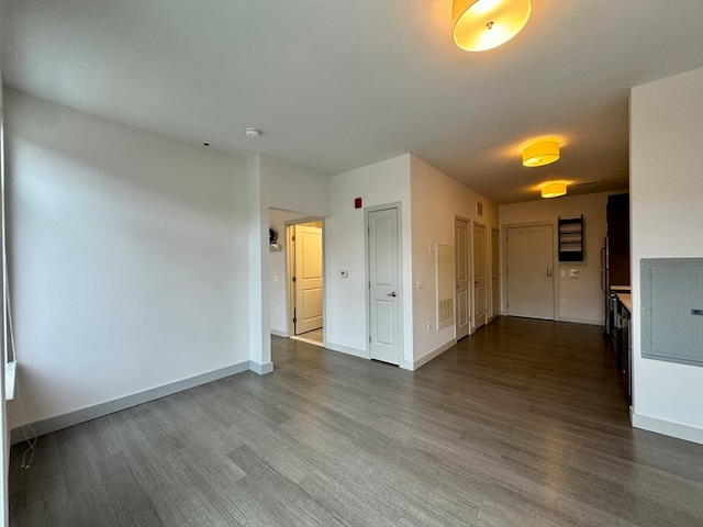 unfurnished room with hardwood / wood-style floors