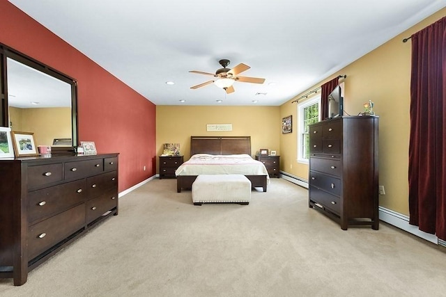 bedroom with baseboard heating, light colored carpet, baseboards, a ceiling fan, and recessed lighting