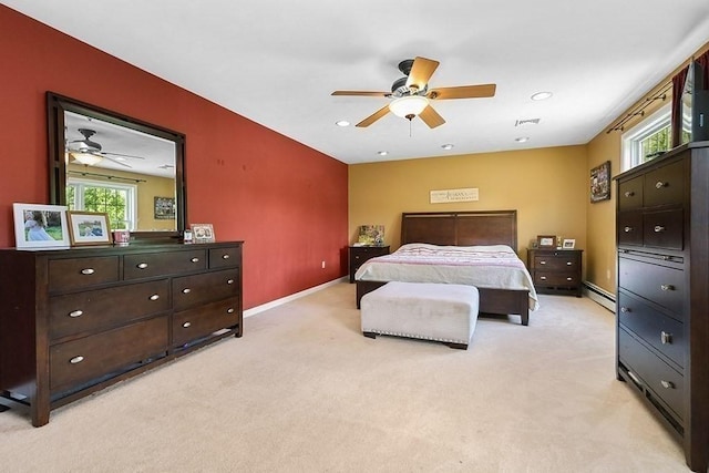 bedroom with light colored carpet, multiple windows, a baseboard radiator, baseboards, and recessed lighting