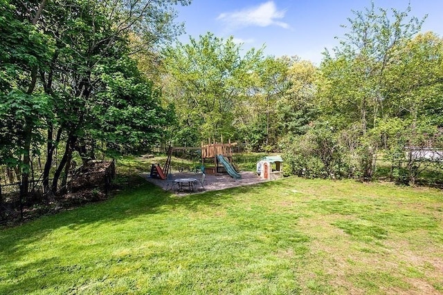 view of yard with a playground