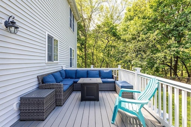 deck featuring outdoor lounge area