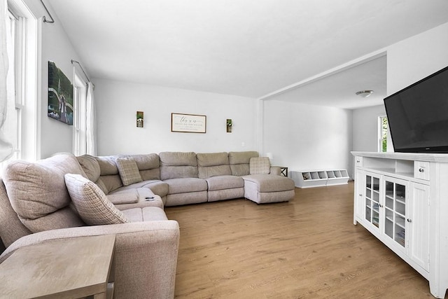 living area with light wood-style floors