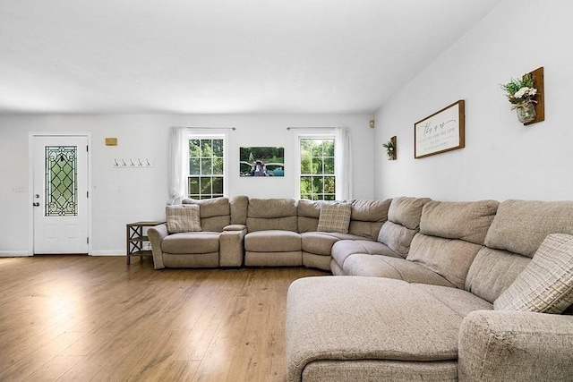 living room with light wood-style floors and baseboards