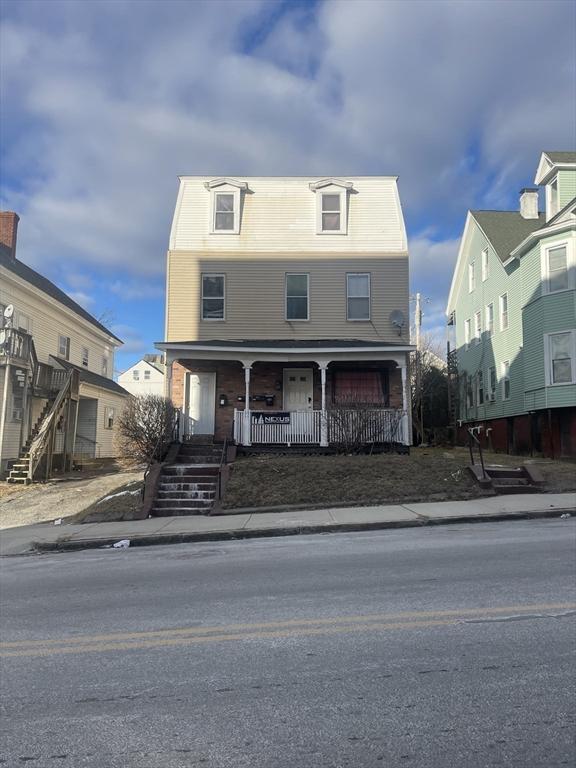 front of property with a porch