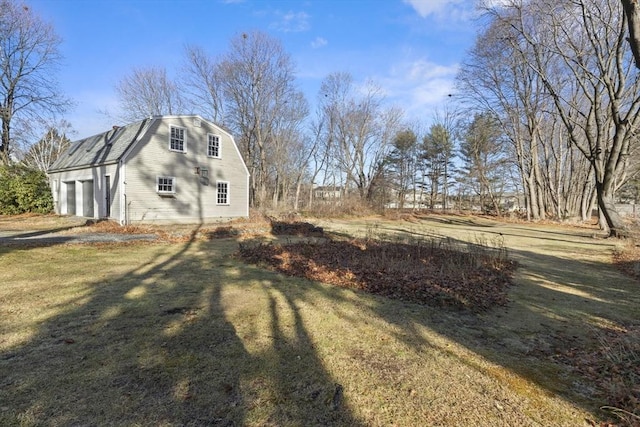 view of property exterior with a lawn