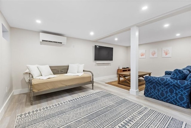 69 Naugus Ave, Marblehead, MA 01945 - living room with an AC wall unit, light wood-style flooring, baseboards, and recessed lighting