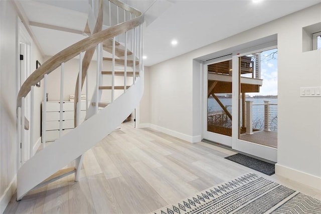 69 Naugus Ave, Marblehead, MA 01945 - stairway with baseboards, recessed lighting, and wood finished floors
