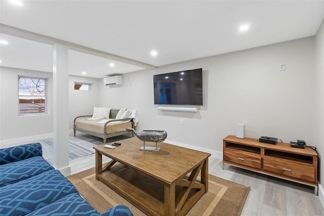69 Naugus Ave, Marblehead, MA 01945 - living area featuring a wall mounted air conditioner, wood finished floors, recessed lighting, and baseboards