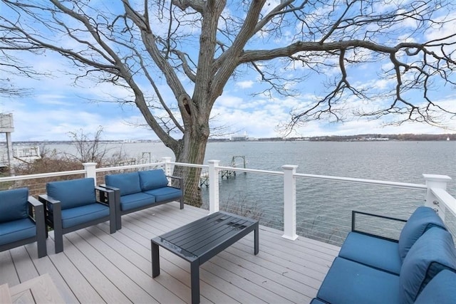 69 Naugus Ave, Marblehead, MA 01945 - wooden deck featuring a water view and an outdoor living space