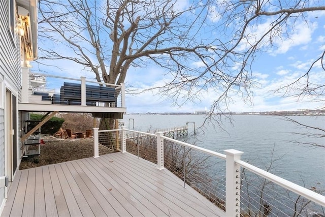 69 Naugus Ave, Marblehead, MA 01945 - wooden terrace with a water view