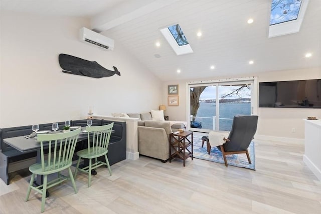 69 Naugus Ave, Marblehead, MA 01945 - living area featuring a skylight, a wall mounted AC, beam ceiling, light wood-style floors, and recessed lighting