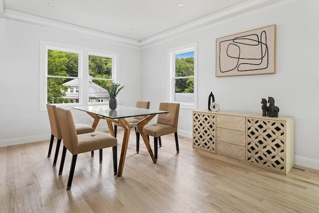 96 Dutton St, Malden, MA 02148 - dining room featuring healthy amount of natural light, crown molding, and light wood-style flooring