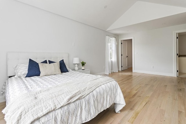 96 Dutton St, Malden, MA 02148 - bedroom with vaulted ceiling and wood finished floors