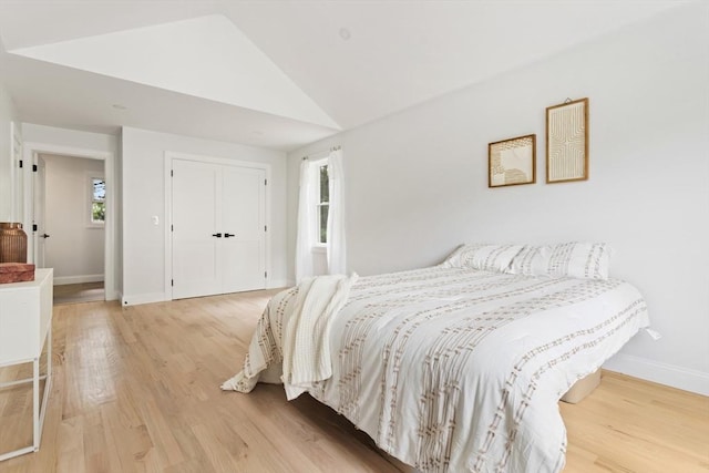 96 Dutton St, Malden, MA 02148 - bedroom featuring light wood finished floors, lofted ceiling, and a closet