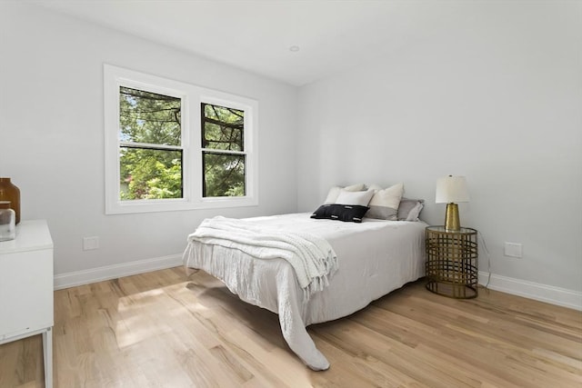 96 Dutton St, Malden, MA 02148 - bedroom featuring light wood-type flooring and baseboards