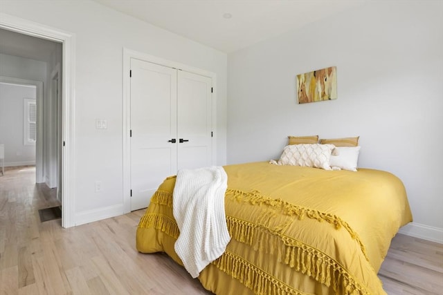 96 Dutton St, Malden, MA 02148 - bedroom featuring light wood-style flooring and a closet