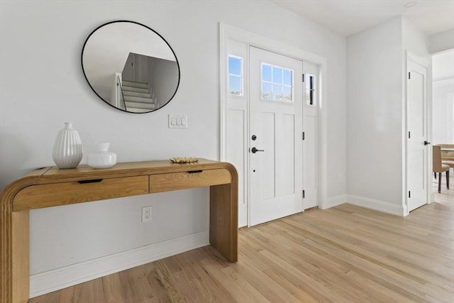 96 Dutton St, Malden, MA 02148 - entryway with light wood-style floors and baseboards