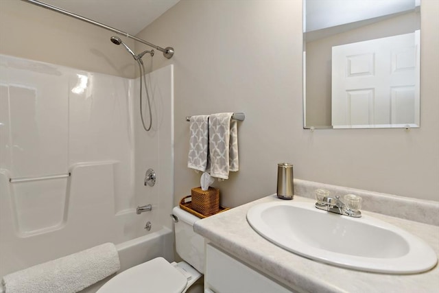 full bathroom featuring toilet, vanity, and shower / tub combination