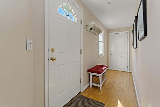 doorway to outside featuring light hardwood / wood-style floors