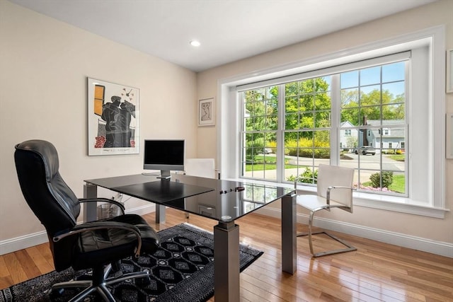 office area featuring baseboards, wood-type flooring, and recessed lighting