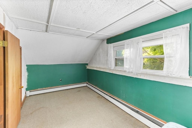 209 S St, Wrentham, MA 02093 - additional living space with baseboard heating, carpet flooring, lofted ceiling, and baseboards