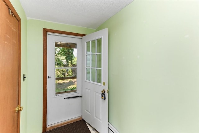 209 S St, Wrentham, MA 02093 - doorway to outside with a textured ceiling
