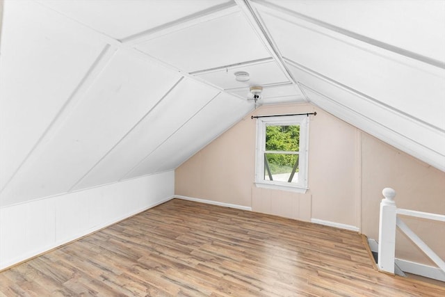 209 S St, Wrentham, MA 02093 - bonus room with wood finished floors, vaulted ceiling, and baseboards