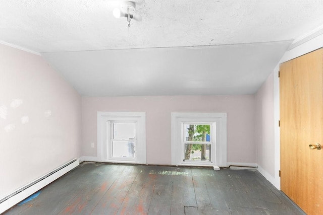 209 S St, Wrentham, MA 02093 - unfurnished living room with baseboard heating, hardwood / wood-style flooring, lofted ceiling, and baseboards