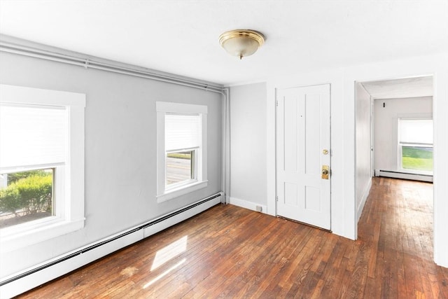 209 S St, Wrentham, MA 02093 - entryway with a baseboard heating unit and plenty of natural light