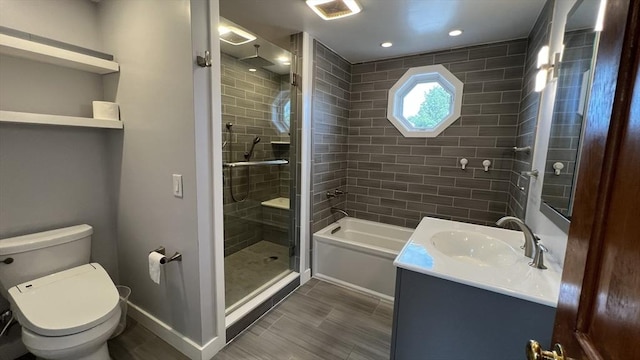 628 Malden St, Revere, MA 02151 - full bath featuring a stall shower, vanity, toilet, a bath, and baseboards