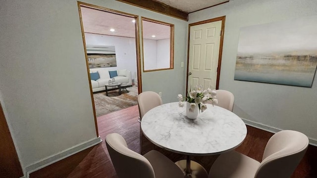 628 Malden St, Revere, MA 02151 - dining space with wood finished floors, baseboards, and recessed lighting