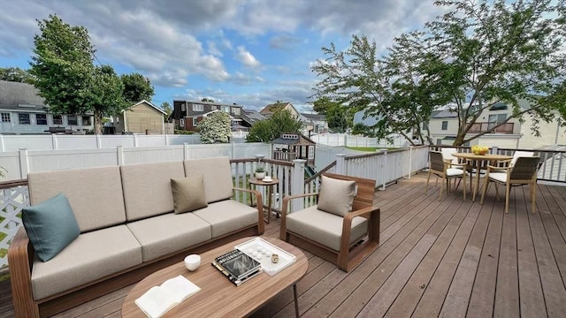628 Malden St, Revere, MA 02151 - deck with an outdoor hangout area, a residential view, a fenced backyard, and outdoor dining area