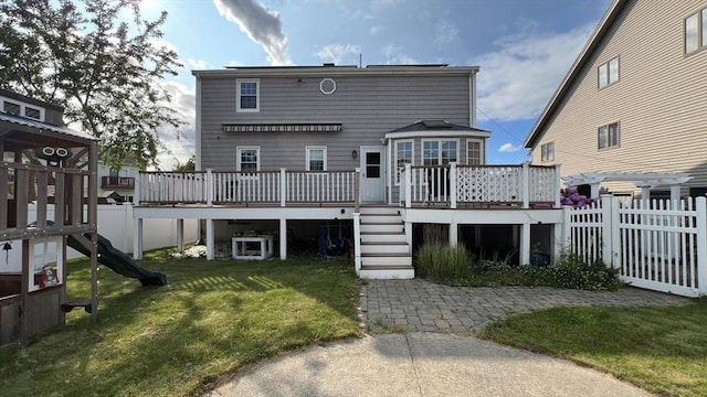 628 Malden St, Revere, MA 02151 - back of house featuring a wooden deck and stairs