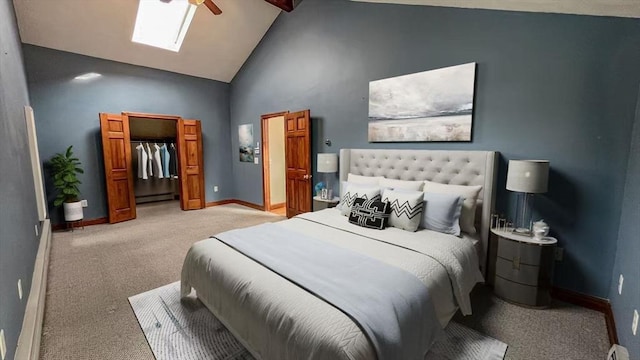 628 Malden St, Revere, MA 02151 - carpeted bedroom featuring a baseboard radiator, a skylight, baseboards, a closet, and ceiling fan
