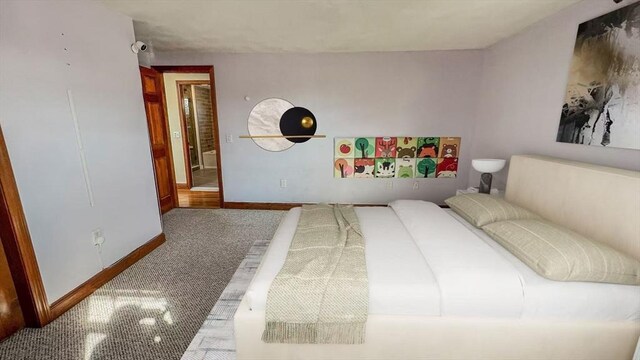628 Malden St, Revere, MA 02151 - carpeted bedroom featuring baseboards
