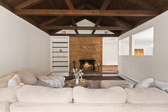 126 Prospect Hill St, Taunton, MA 02780 - living room with baseboard heating, wooden ceiling, dark wood-style floors, a stone fireplace, and baseboards