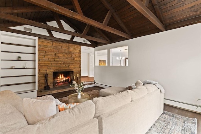 126 Prospect Hill St, Taunton, MA 02780 - living area featuring wood finished floors, baseboard heating, a stone fireplace, wooden ceiling with exposed beams, and a chandelier