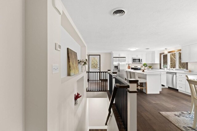 126 Prospect Hill St, Taunton, MA 02780 - staircase featuring wood finished floors