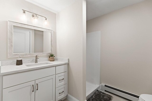 126 Prospect Hill St, Taunton, MA 02780 - bathroom with a baseboard radiator, vanity, toilet, a walk in shower, and baseboards