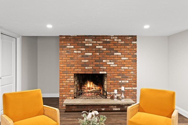 126 Prospect Hill St, Taunton, MA 02780 - sitting room featuring baseboards, wood finished floors, recessed lighting, and a brick fireplace