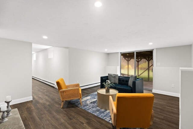 126 Prospect Hill St, Taunton, MA 02780 - living area with a baseboard radiator, wood finished floors, baseboards, and recessed lighting