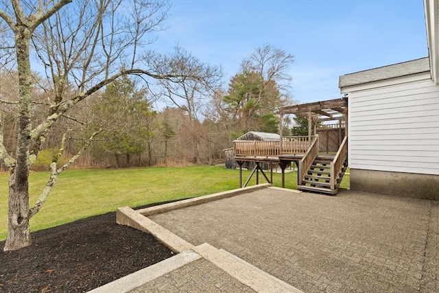 126 Prospect Hill St, Taunton, MA 02780 - view of green lawn featuring a wooden deck, stairway, and a patio