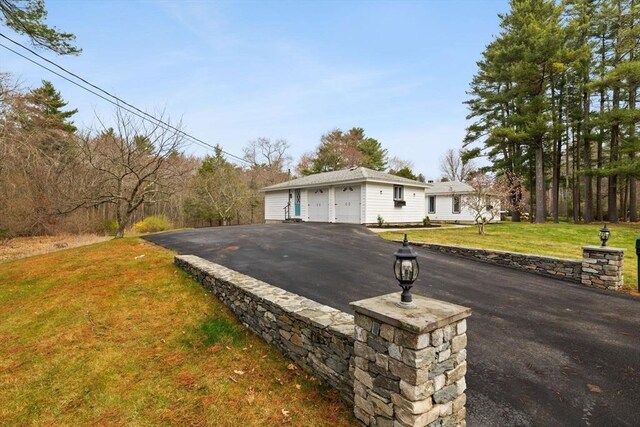 126 Prospect Hill St, Taunton, MA 02780 - single story home with a garage and a front lawn