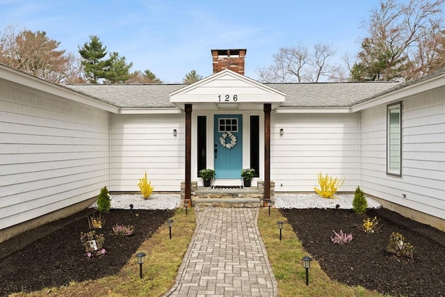 126 Prospect Hill St, Taunton, MA 02780 - doorway to property with a chimney and roof with shingles
