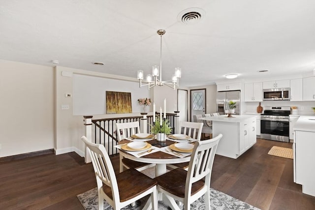 126 Prospect Hill St, Taunton, MA 02780 - dining space with dark wood-type flooring, a chandelier, and baseboards