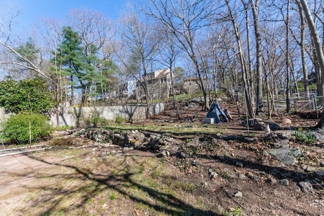 view of yard featuring fence