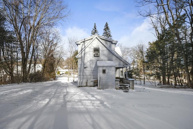 view of snow covered house