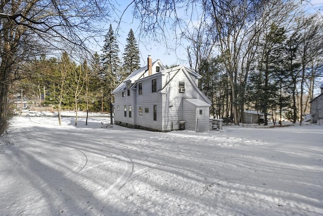 view of snow covered property